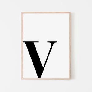 May include: A black and white printable wall art print featuring the letter V in a bold, sans-serif font.