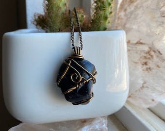 Dark Rhodonite in Antique Brass