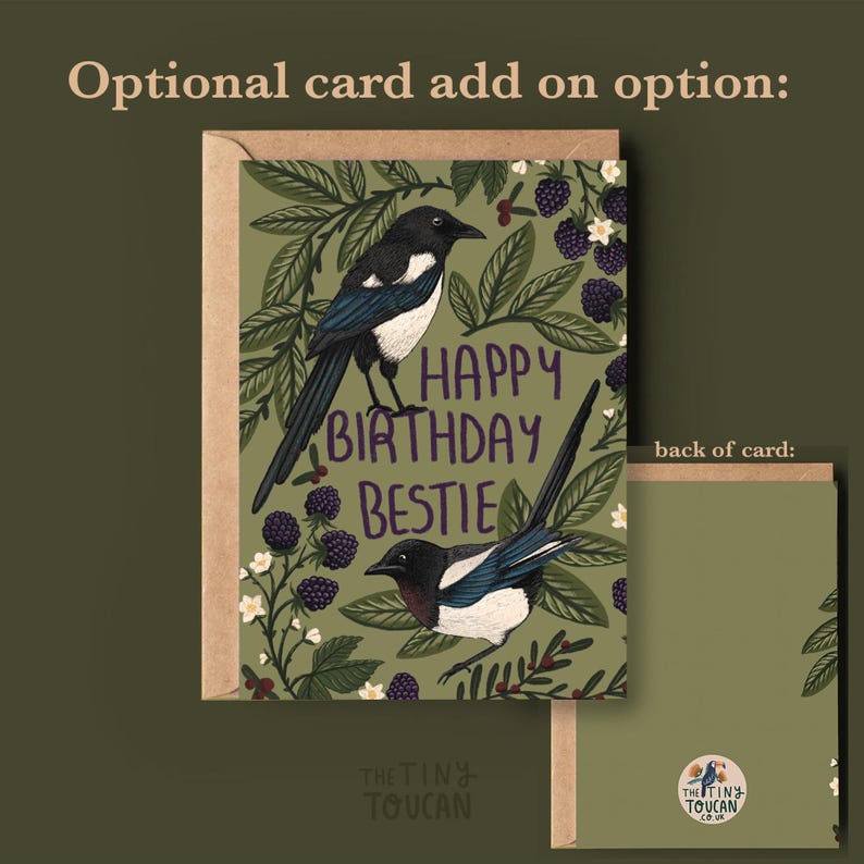 May include: A birthday card featuring a magpie design and the words "Happy Birthday Bestie." The card has a green background with floral and berry details. The back of the card is plain green.