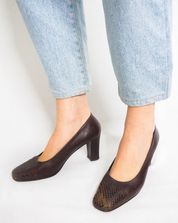 snake embossed pumps