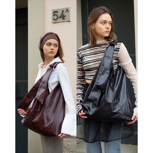 ANEW STUDIO &#39;Yuki&#39; Bag (Black & Maroon). Handmade hobo bag from our in-house line. Handcrafted in Florence, Italy from deadstock leather.