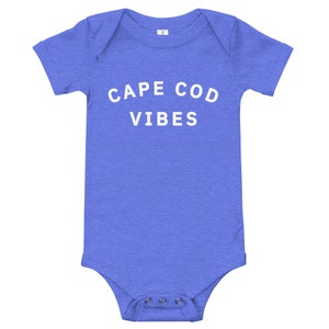 May include: A blue baby onesie with white text that reads "CAPE COD VIBES".