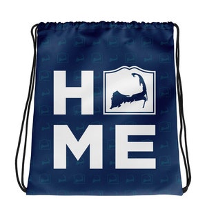 May include: A blue drawstring bag with a white "HOME" graphic and a silhouette of Cape Cod. The bag is covered in a repeating pattern of the Cape Cod silhouette.