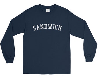 May include: A navy blue long-sleeve t-shirt with the word "SANDWICH" printed in white on the front.