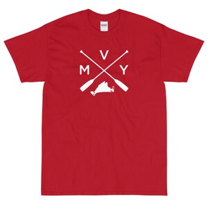 May include: Red short-sleeved t-shirt with a white graphic of a crossed pair of oars with the letters "V" and "Y" on top and "M" and "Y" on the bottom. The graphic also includes the outline of the state of Virginia.