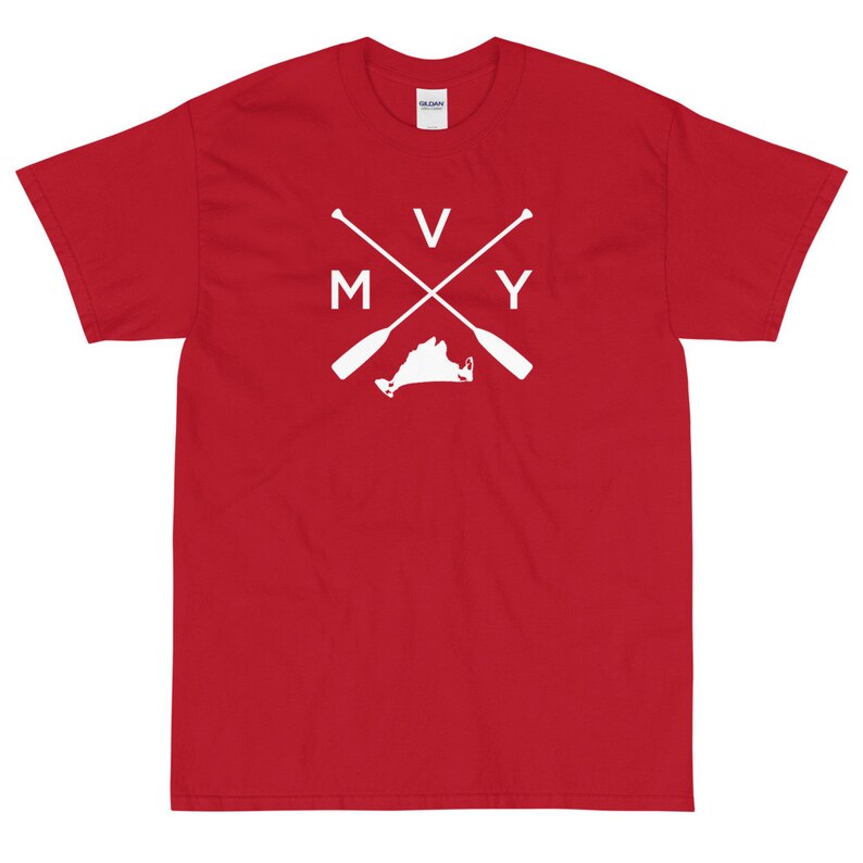 May include: Red short-sleeved t-shirt with a white graphic of a crossed pair of oars with the letters "V" and "Y" on top and "M" and "Y" on the bottom. The graphic also includes the outline of the state of Virginia.