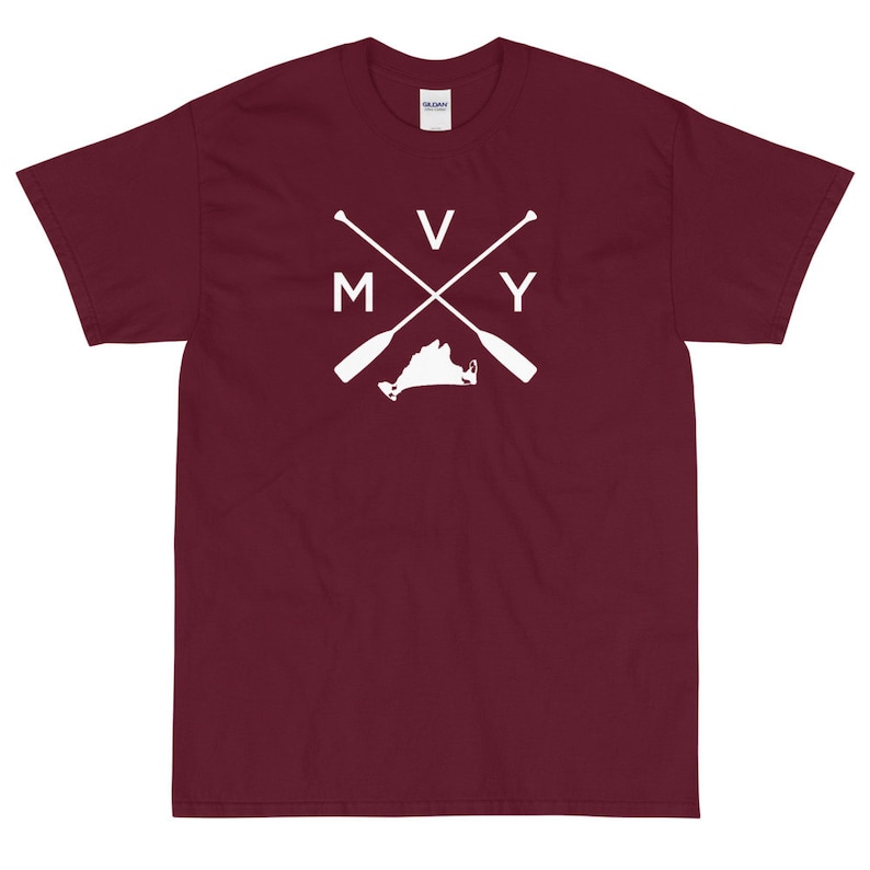 May include: Burgundy short-sleeved t-shirt with a white graphic of a crossed pair of oars with the letters "V" and "Y" on the oars and the letters "M" and "Y" on the handles. The graphic also includes the outline of the state of Virginia.
