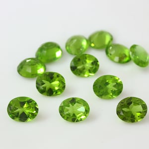 Natural Peridot Oval Olive Green Loose Gemstone AA Quality, Available in 12x10 mm and 14x10 mm,