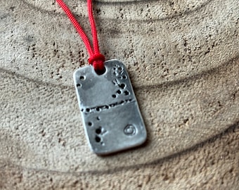 Small Silver Pendant with Red Strap