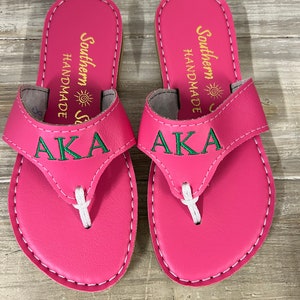 AKA in pink sandals