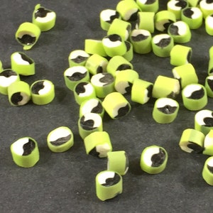 Murrine Millefiori yin-yang symbol Green black white 104 glass Sold by half ounce Item #08