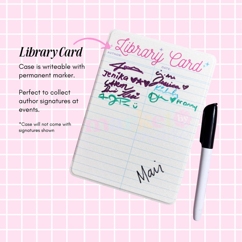 a library card with a black pen and a pink background.
