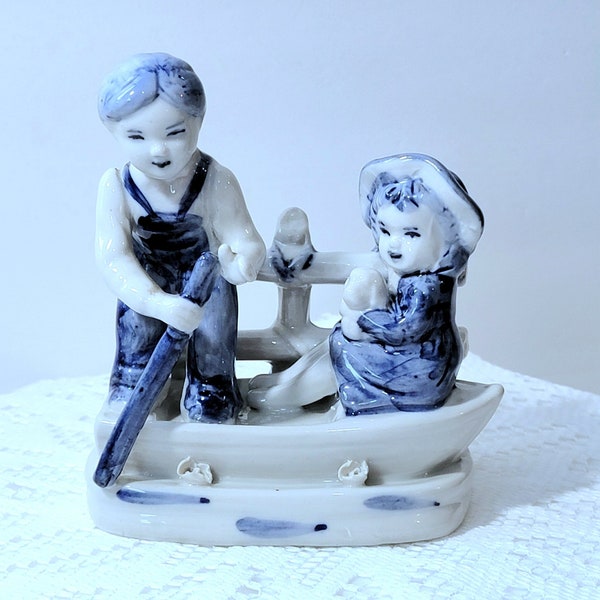 Mid-century Boy and Girl on Boat Figurine, Blue and White Ceramic Figurine, Children with Puppy Figurine,  Vintage Figurine, *Description