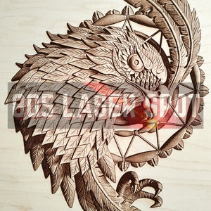 May include: A wooden carving of an eagle with its wings spread out, holding a dreamcatcher in its talons. The eagle is intricately detailed, with feathers and scales carved into its body. The dreamcatcher is also detailed, with a web of string and beads.