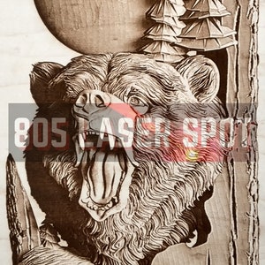 May include: A wood carving of a bear with its mouth open, roaring, with a full moon and trees in the background.