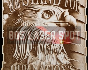 May include: A wooden sign with a bald eagle and the text "We Stand For Our Nation's Flag & Anthem".