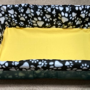 Tiny Dog Whelping Box Cover Liner for Litters Puppies Kittens - White Paws on Black with Yellow Bottom