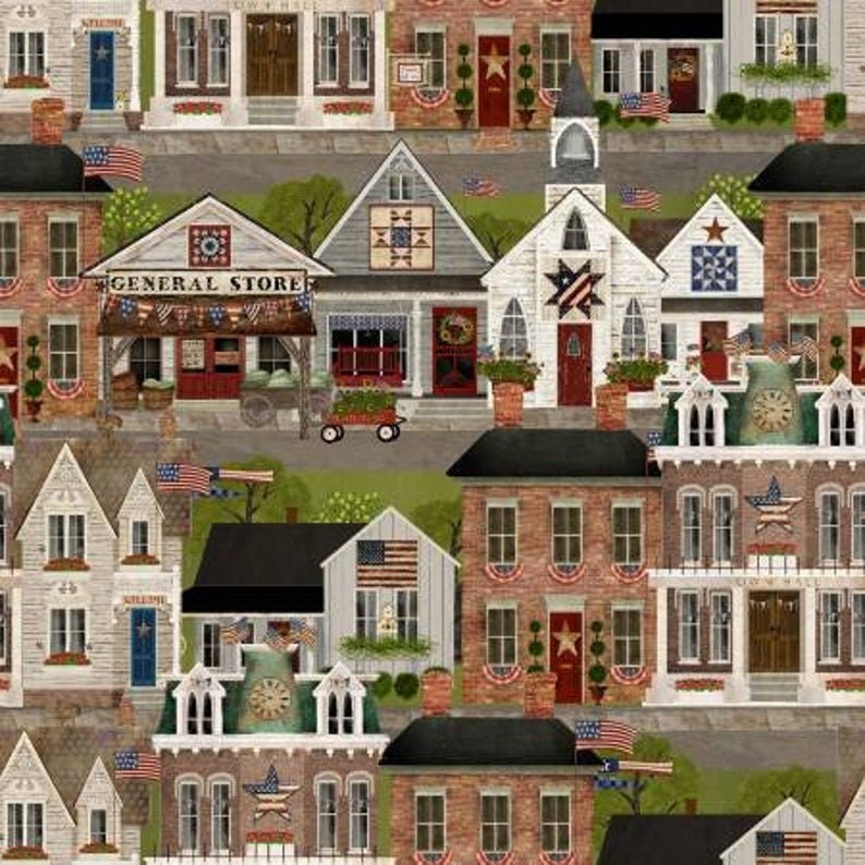 May include: A colorful illustration of a small town with red brick buildings, white clapboard houses, and a general store. The buildings are decorated with stars and stripes, and there are American flags flying in the breeze. The town is set against a backdrop of green trees and a blue sky.