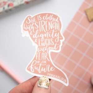 Proverbs 31:25 Sticker – Pink Vinyl Christian Design for Gifts or Daily Inspiration