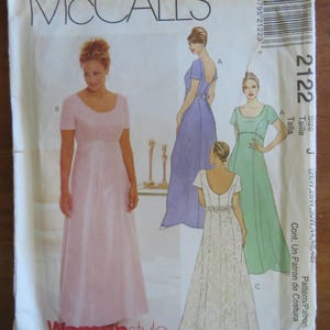 May include: A McCall's Womanstyle sewing pattern envelope with illustrations of women's dresses in pink, lilac, and green. The envelope displays the number 2122 and the words "Petite-Able". Measurements are in inches.