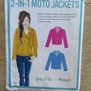 May include: A sewing pattern for 2-in-1 moto jackets. The pattern features illustrations of a yellow, pink, and blue moto jacket. The text on the pattern reads "2-IN-1 MOTO JACKETS" and "Sizes XS-XL".