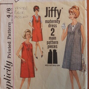 May include: Vintage Simplicity sewing pattern for a Jiffy maternity dress. The pattern includes two main pieces and features a size 16 with a 36-inch bust. The cover art shows illustrations of the dress in different styles.