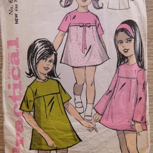 Molde de costura prático 6124 para vestido infantil feminino estilo pulôver com pala frontal, tamanho 7-9 anos, completo.
