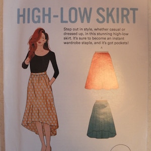 May include: A sewing pattern for a high-low skirt. The image features a drawing of a woman wearing the skirt, along with illustrations of the skirt in two different colors. Text on the pattern reads "HIGH-LOW SKIRT" and "Sizes XS-XL."