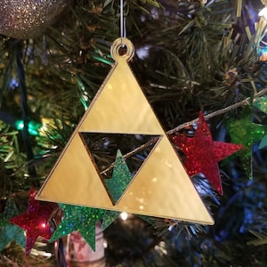 Large Triforce gold mirror hanging ornament for Legend of Zelda fans