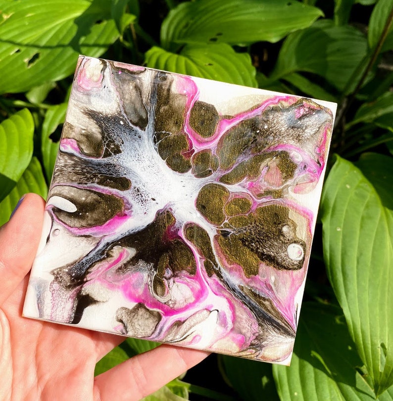 Pink and gold color burst coasters