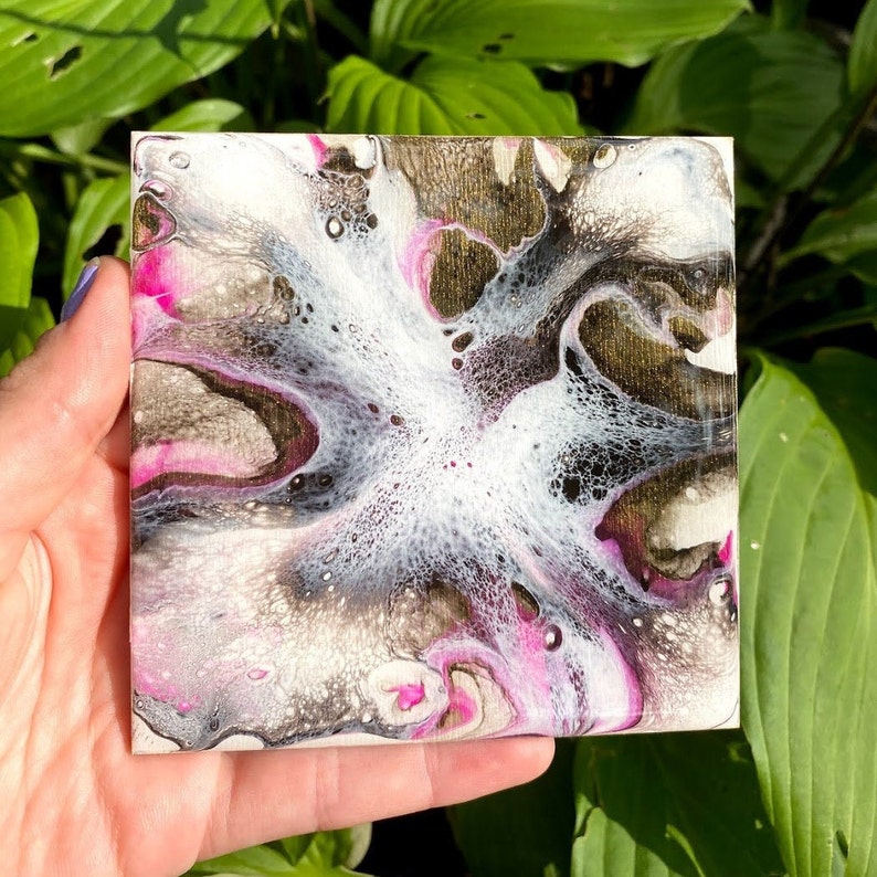 Pink and gold color burst coasters