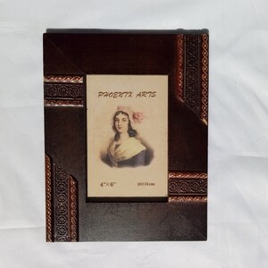 Vintage wood photo frame with metal decoration in Victorian style, Retro Tabletop frame for home decor, Old style picture frame.