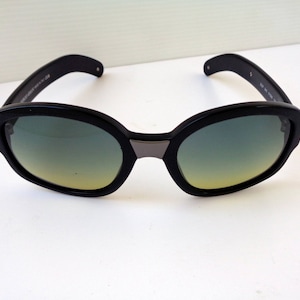 Vintage GIORGIO ARMANI collection sunglasses in a wide frame. ARMANI glasses frame. Branded collectible eyewear.