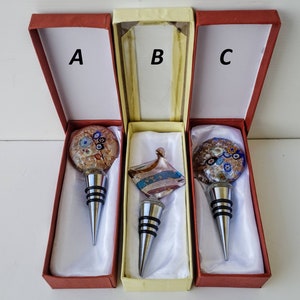 Italian decorative colorful glass bottle stopper in Murrina Murano style. Rubbered airtight bottle stopper with decorative glass top