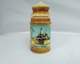 Vintage ceramic pot. Small pottery honey jar with the lid.
