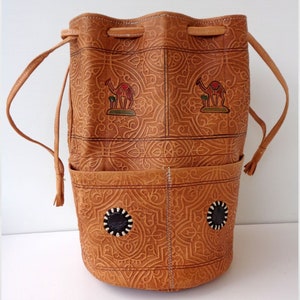 Branded Vintage brown embossed leather backpack bag by LIBERTY (London), Woman genuine leather shoulder bag. Bright brown crossbody bag.