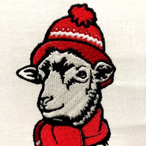 Schaf im Winter Mütze und Schal Maschinenstickerei Muster Stickdatei