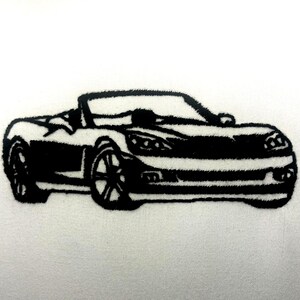 May include: Black and white silhouette of a convertible sports car with the top down.