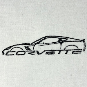 May include: Black embroidered outline of a Corvette sports car on a white fabric background. The word "CORVETTE" is embroidered below the car's silhouette. The design is simple and elegant, suitable for automotive enthusiasts.