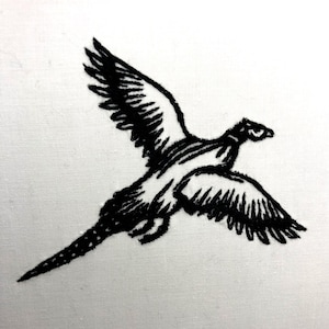 May include: Black and white embroidered image of a pheasant in flight.