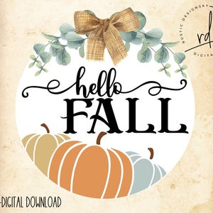 May include: A circular fall-themed design with the words "hello FALL" in black script and bold font. The design includes pumpkins in shades of orange and tan, with a bow and greenery at the top. The words "SVG-DIGITAL DOWNLOAD" are at the bottom.