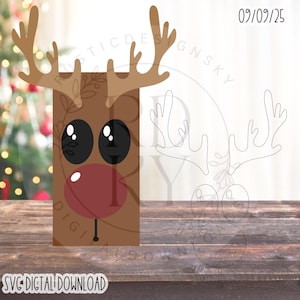 May include: A brown reindeer design with large black eyes, a red nose, and antlers. The image includes a line drawing of the reindeer and the text "SVG DIGITAL DOWNLOAD" at the bottom. The date "09/09/25" is in the upper right corner.