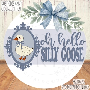 May include: A round, light blue and white design with the text "oh hello SILLY GOOSE". It features a cartoon goose in a blue frame, a blue bow, and leafy accents. The design is a digital download.