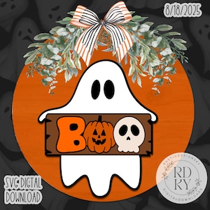 May include: A Halloween-themed digital design featuring a white ghost holding a sign that says "BOO" with a pumpkin and skull. The design is on an orange background with a decorative bow and greenery.
