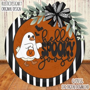 May include: A round sign featuring a black and white striped border, an orange center, and a graphic of a goose dressed as a ghost holding a pumpkin bucket. The text reads hello SPOOKY goose. A black and white bow and green leaves are at the top.