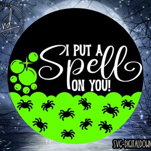 May include: A black and green Halloween-themed circle with the text "I put a spell on you!" and a green slime design with spiders.