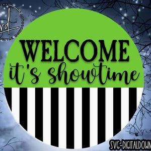 May include: A green circle with the text "Welcome it's showtime" in black. The bottom half of the circle is black and white stripes.