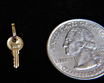 14 k Solid Gold Key Charm 8 mm not including bail