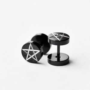 May include: A pair of black stainless steel ear studs with a silver pentagram design.