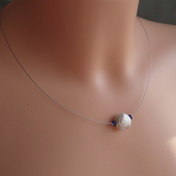 Simple necklace with silver snail and blue glass beads